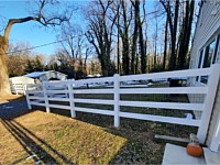 <b>5 foot high 4 board white vinyl ranch rail with mesh</b>